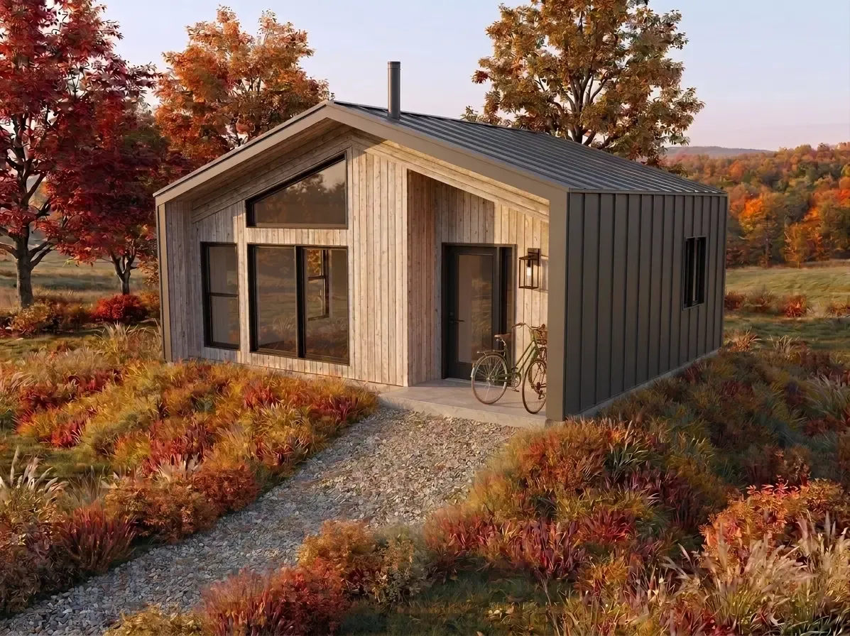 Magni480 compact home exterior rendering with timber cladding and dark metal siding in an autumn landscape
